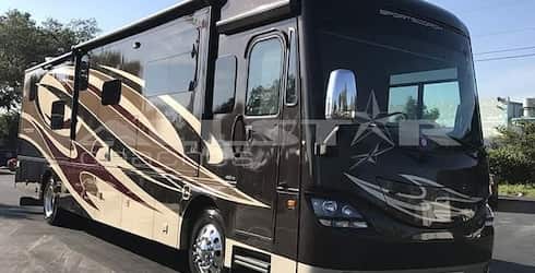 RV Rental: 41′ Cross Country Sportscoach -Exterior view - front entryway