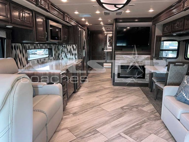 RV Rental: 40' Fleetwood Discovery - interior - common area with fireplace