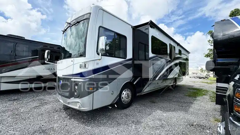 RV Rental: 40' Endeavor by Holiday Rambler - exterior driver side with slides extended