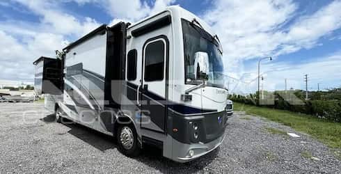 RV Rental: 39' Endeavor Holiday Rambler - Exterior view with Slides extended and entryway